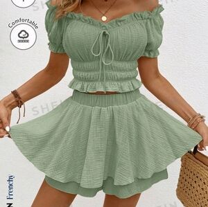 Green blouse and skort set